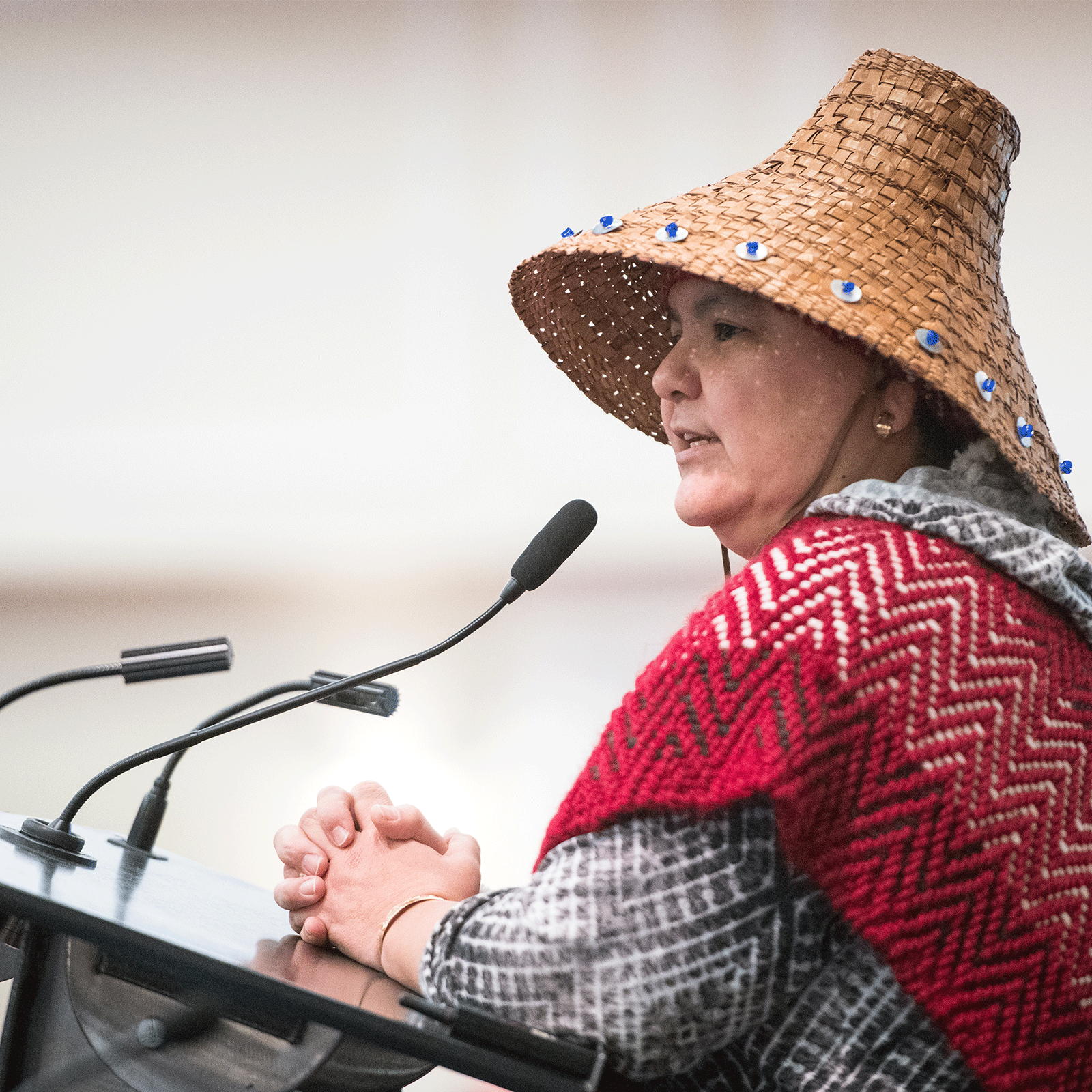 native canadian woman speaking at a conference