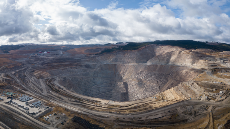 Aerial panoramic view of a copper mine in British Columbia.